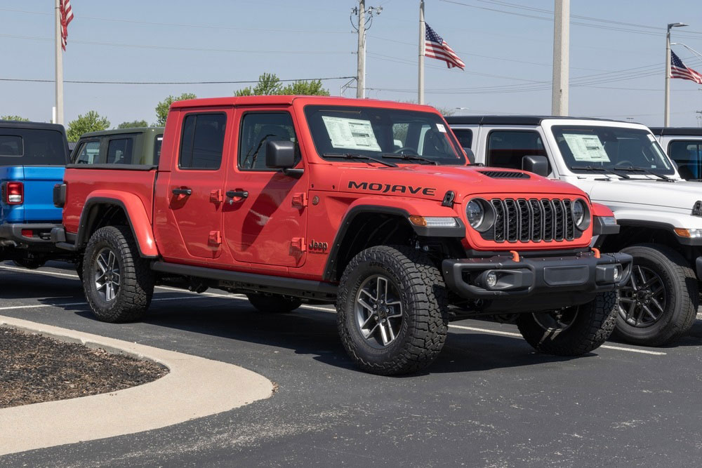 Jeep Gladiator interior with rugged seat covers designed for outdoor adventures.