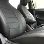 A luxury car interior with high-quality seat covers installed.